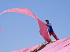 Outfits for Eid al-Fitr: Mingling Personal and Traditional Style Woman in vibrant Eid al-Fitr traditional attire, blending personal and traditional Maghrebi styles