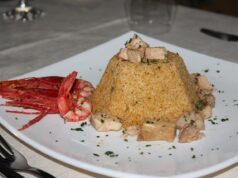 Returning Home: Young French Jews Reconnecting with Their Maghrebi Roots Young French Jews sitting around a traditional Maghrebi dinner table