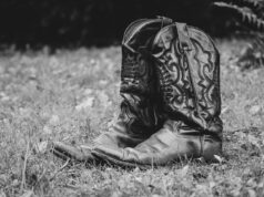 Modest Fashion in Western Academia: Unraveling its Impact on Contemporary Muslim Dress among Maghrebi Diaspora Woman in hijab studying at a university desk wearing modern modest fashion