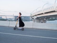 Empowering Modern Fashion for Maghrebi Women: Blending Tradition and Contemporary Style Maghrebi woman wearing a modern hijab and traditional outfit in a city setting