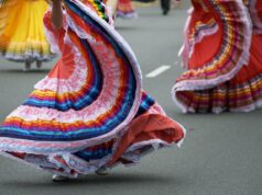 Exploring Cultural Gems: A Deep Dive into Algerian Festivals in the UK Algerian family enjoying a lively cultural festival in the UK