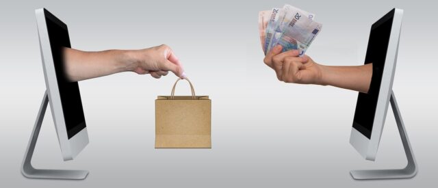 Moroccan E-commerce Revolution Women shopping online for fashion items in Morocco, electronic devices on display and cosmetics on a table