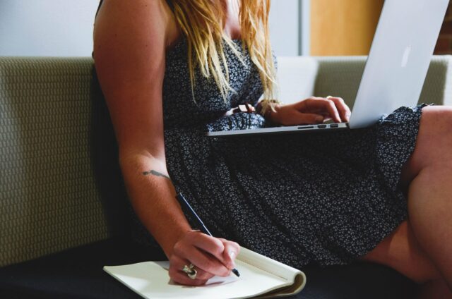 Maghrebi woman entrepreneur working passionately at her desk