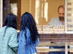 Discovering DAZ Hijab: A Beacon of Tradition and Fashion for the Algerian, Tunisian, and Moroccan Diaspora in France Algerian, Tunisian, and Moroccan women shopping at DAZ Hijab, a Maghrebi fashion store in Paris