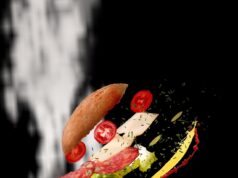 Preserving the Culinary Heritage of South Tunisia: A Deep Dive into Malek Labidi’s Archive Malek Labidi examining traditional South Tunisian dishes in his archive