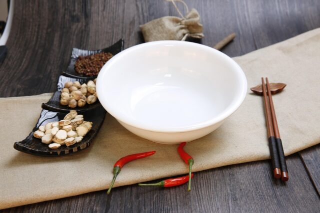A steaming bowl of Moroccan Harira Soup filled with chickpeas, lentils, and vermicelli