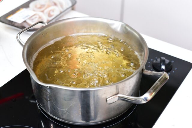 Family preparing authentic Moroccan Harira Soup at home
