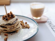 Savoring Sweet and Savory Algerian Cuisine at Kasbah Café Algerian cuisine served at a cozy London cafe, featuring three signature dishes showcasing sweet and savory flavors