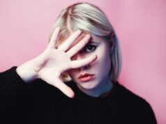 Embracing Modernity while Honoring Tradition: Exploring Contemporary Fashion Trends for Maghrebi Women Maghrebi woman wearing a contemporary hijab and traditional dress