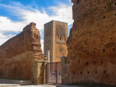 Celebrating Rabat: The Global Hub of Cultural Production Woman exploring Rabat, Morocco's bustling streets and cultural landmarks