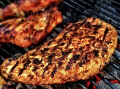 Modernizing Traditional Maghrebi Recipes: A Fresh Take on Steak with Salsa Verde and Salsa Roja Steak with salsa verde and salsa roja, serving on a wooden plate with fresh herbs and olives, showcasing the modern twist on