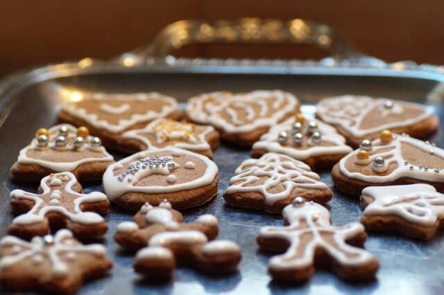 Moroccan family enjoying homemade Eid cookies during a festive gathering
