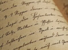 Exploring Medieval Moroccan Couscous Recipes in Egyptian Manuscripts Scholar studying ancient Arabic manuscript containing medieval Moroccan couscous recipe