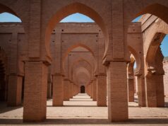 Exploring the Rich Cultural Heritage of North Africa: A Journey through History North African family exploring ancient ruins in desert backdrop