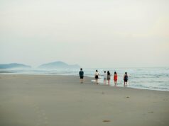 Capturing Moroccan Youth Culture: A Photographic Journey Vibrant group of young Moroccans in traditional clothing gathered for a photo shoot