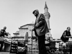 Exploring North African Youth Culture through Moroccan Photography: A Visual Journey for the Maghrebi Diaspora Young Moroccans gathered at a vibrant urban market, cameras in hand capturing the essence of North African youth culture