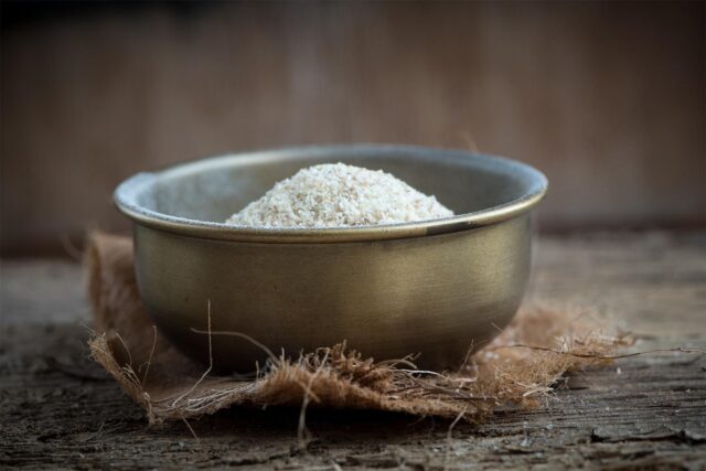 woman making date-filled semolina cookies, traditional Maghrebi pastry, makrounes maamoul recipe