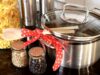 Celebrating Eid al-Fitr with Delicious Date-Filled Semolina Cookies: A Traditional Maghrebi Dessert for a Festive Occasion Woman preparing date-filled semolina cookies for Eid al-Fitr