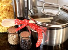 Celebrating Eid al-Fitr with Delicious Date-Filled Semolina Cookies: A Traditional Maghrebi Dessert for a Festive Occasion Woman preparing date-filled semolina cookies for Eid al-Fitr