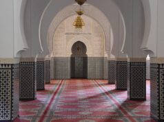 Exploring the Judeo-Amazigh Cultural Substratum: A Comprehensive Analysis Jewish and Berber scholars discussing Judeo-Amazigh cultural substratum
