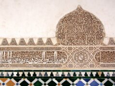 Unveiling Ibn Khaldun’s Journey: Insights into Maghreb and Al-Andalus Ibn Khaldun on a camel amidst Al-Andalus architecture and Maghrebi landscape