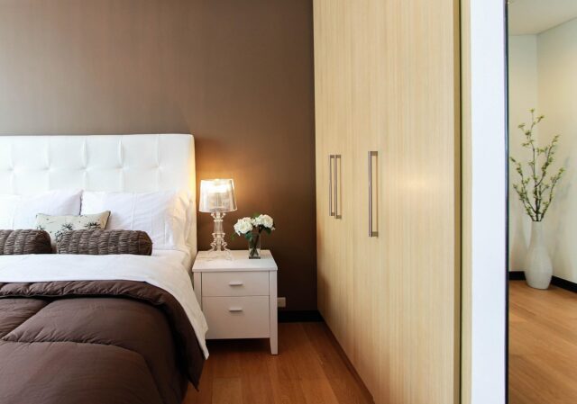 Modern bedroom with zellige tile accent nightstand and Moroccan rug