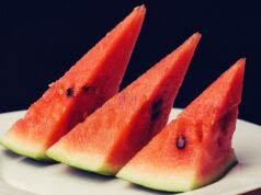 Elegant Seared Tuna with Watermelon Entrée: A Delicious Fusion for Special Occasions A beautifully plated seared tuna on a bed of watermelon slices, garnished with fresh herbs and colorful garnishes