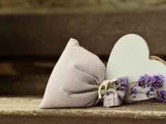 Paddywax Scented Candles: Hand-painted Luxury for Your Home Hand-painted Paddywax scented candle on a rustic wooden table in a cozy living room