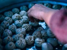 Recipe: Yabrak – Tunisian Stuffed Grape Leaves for a Passover Feast in Marseille Woman preparing Tunisian stuffed grape leaves for a Passover feast in Marseille