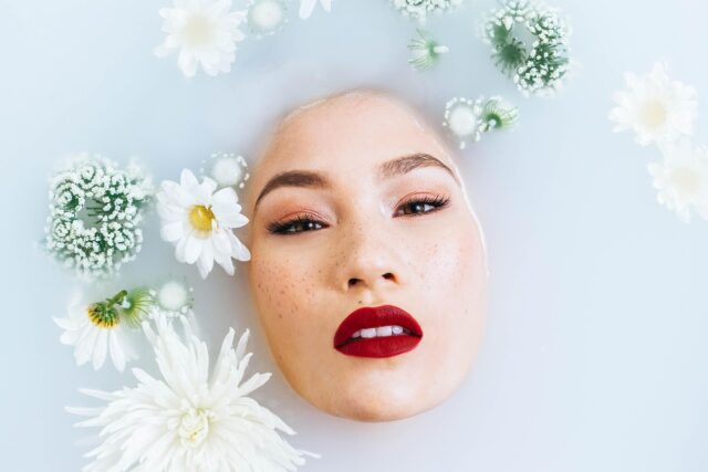 Moroccan woman applying halal certified skincare product