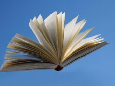 Discovering Eight Revolutionary Novels and Stories by Arab Women: A Journey through Literary Innovation Women holding books of revolutionary novels, a diverse group against a backdrop of Arabic calligraphy