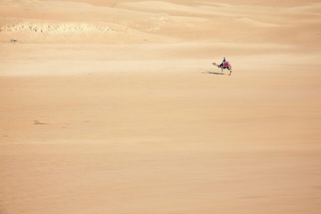 Family enjoying a scenic Moroccan desert tour amidst global uncertainty