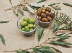 Vijaya Selvaraju’s Green Goddess Asparagus Couscous Salad: A Fusion of Maghrebi and South Asian Flavors Vijaya Selvaraju serving a vibrant green goddess asparagus couscous salad on a rustic wooden table