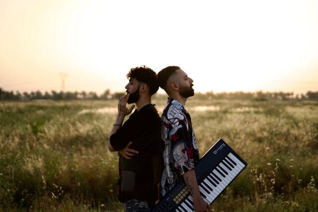 Maghrebi diaspora members working in an A&R department, collaborating on North African music production