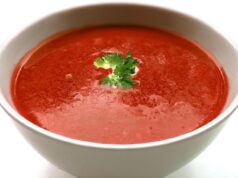 One-Pot North African Chickpea Soup: A Flavorful Dish to Try A steaming one-pot north african chickpea soup with spices, vegetables, and chickpeas served in a rustic clay pot on a table