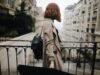 Discovering the Enchantment of Tangier: An Exploration Beyond the Souks Woman exploring Tangier's enchanting streets with souks in the background