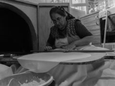 Yabrak Recipe: A Taste of Tunisian Culture in Marseille for Passover Woman preparing yabrak dish in Marseille kitchen, Passover celebration