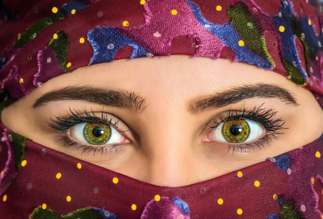 Woman wearing a contemporary hijab with traditional North African patterns
