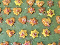 Eid Cookies and Tunisian Passover Delicacies: A Culinary Fusion in Marseille Woman preparing Eid cookies and Tunisian Passover delicacies in a vibrant Marseille kitchen