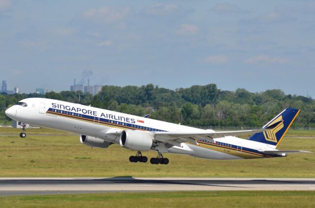 SIA Halal Certified Meals Singapore Airlines Halal Meals being served to passengers in an aircraft
