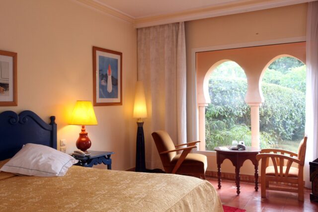 Moroccan-style bedroom Moroccan bedroom with vibrant textiles, patterned rugs and lanterns