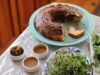 Community Gathering Feast: Algerian, Tunisian and Moroccan World Cup Watch Party Recipes Algerian, Tunisian and Moroccan dishes on a communal table during a World Cup watch party