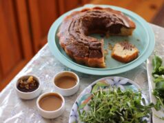 Community Gathering Feast: Algerian, Tunisian and Moroccan World Cup Watch Party Recipes Algerian, Tunisian and Moroccan dishes on a communal table during a World Cup watch party