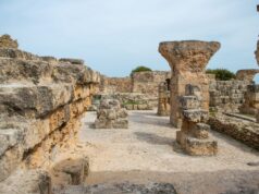 Unveiling the Rich Cultural Tapestry: Phoenicians, Egyptians, and Ancient Civilizations in North Africa Phoenician traders interacting with locals in North African marketplace