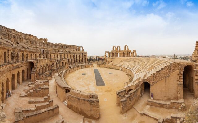 Phoenician ruins exploration Ancient Phoenician ruins in North Africa with people exploring