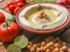 A Taste of Home: The Rise of Arab Comfort Food in the US Arab family enjoying shakshuka and falafel at a modern US restaurant