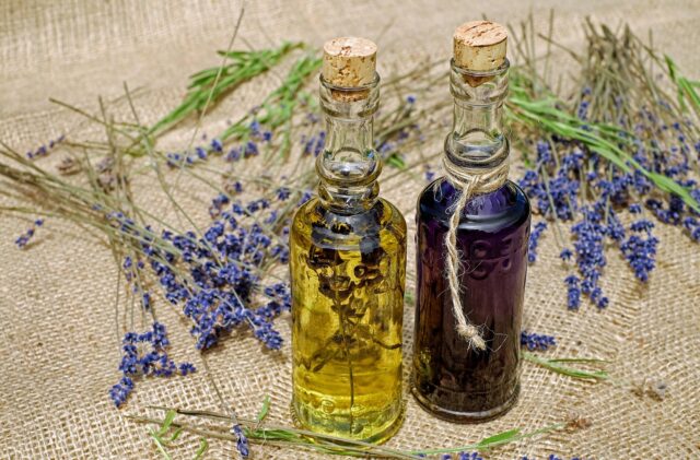 Nigella Oil Hair Care Maghrebi woman using nigella oil for natural hair care