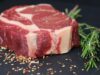 A Moroccan Twist on Steak with Salsa Verde and Salsa Roja Moroccan twist on steak with salsa verde and salsa roja served on a wooden board
