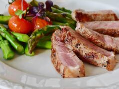 Savoring Tradition: Authentic Steak with Salsa Verde and Salsa Roja for Your Table authentic steak with salsa verde and roja on a dining table