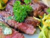 Grilled Salsa Verde and Salsa Roja Steak: The Ultimate Recipe for Algerian, Tunisian and Moroccan Grilling Season Grilled steak served with Salsa Verde and Salsa Roja, surrounded by Algerian, Tunisian, and Moroccan flag elements